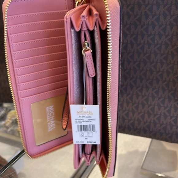 MICHAEL KORS
Leather Continental Wristlet Phone Case Wallet 
Primrose 
NWT - Picture 8 of 16